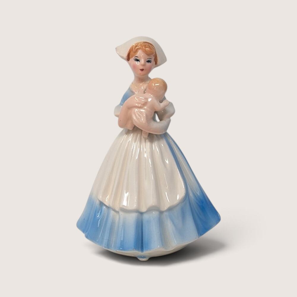 Vintage Nurse Figurine 1950s Ceramic Blue And White Nurse Holding Baby
